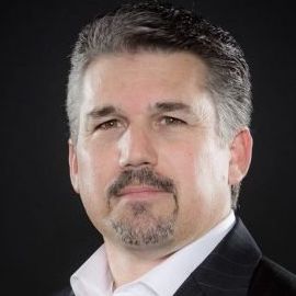 Bruce Benedict Headshot