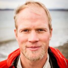 Adam Kreek Headshot