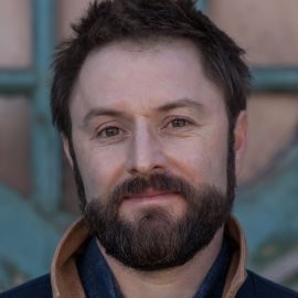 Adam Cayton-Holland Headshot