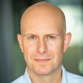Nathaniel Stinnett Headshot